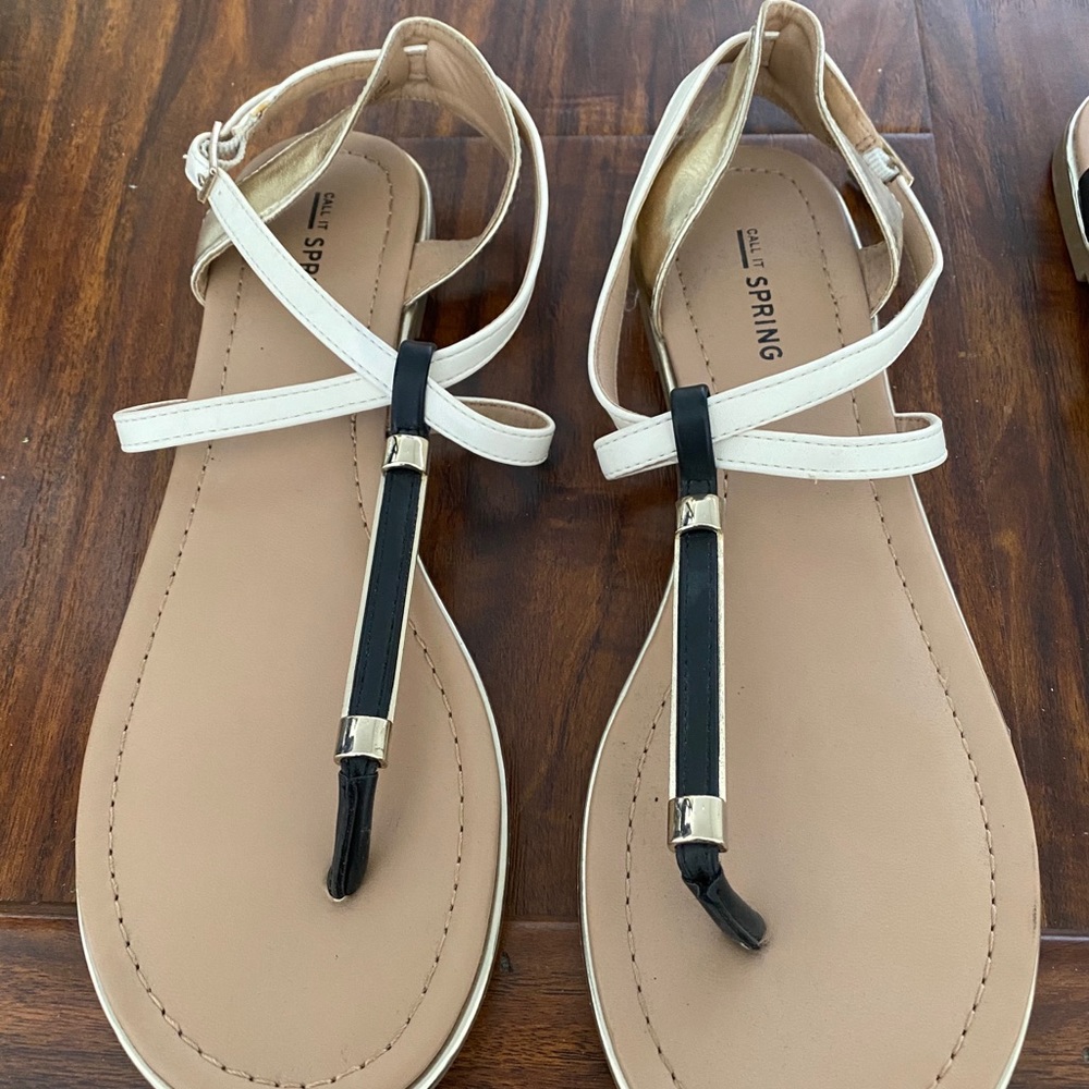 Call it spring white and black thong sandals with gold detail